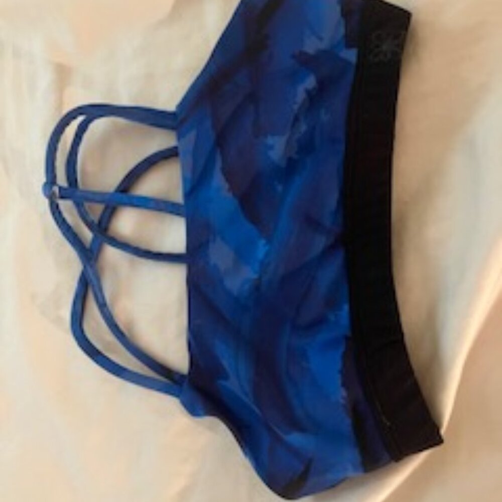 Multiple Blue wash sports bra with a criss crossed back
